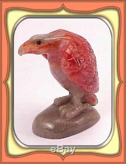 124.0ct Fossilized Utah Red Horn Coral Eagle Carving