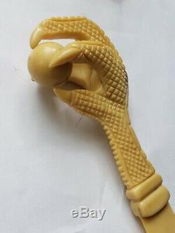 1850s Chinese Natural Carved Eagle Talon Gripping Ball Figural Letter Opener