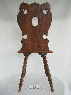Antique hand-carved Black Forest chair around 1880, double-headed eagle, grimaci