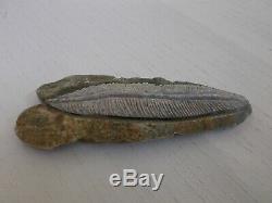 Hand Carved Soapstone Feather Into Rock by Soaring Eagle 2011