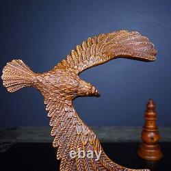 Hand carved boxwood balanced eagle displays its magnificent image