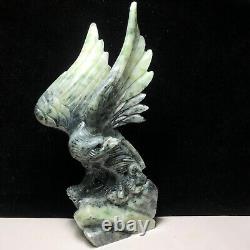 Natural quartz crystal cluster mineral specimen. Dushan Jade. Hand-carved eagle