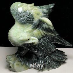 Natural quartz crystal cluster mineral specimen. Dushan Jade. Hand-carved eagle