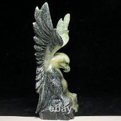 Natural quartz crystal cluster mineral specimen. Dushan Jade. Hand-carved eagle