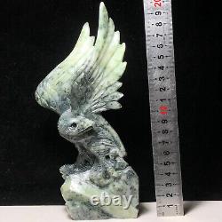 Natural quartz crystal cluster mineral specimen. Dushan Jade. Hand-carved eagle