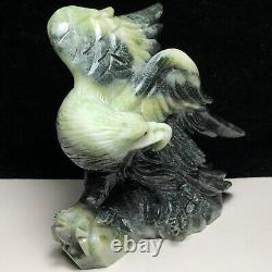 Natural quartz crystal cluster mineral specimen. Dushan Jade. Hand-carved eagle