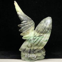 Natural quartz crystal cluster mineral specimen. Dushan Jade. Hand-carved eagle