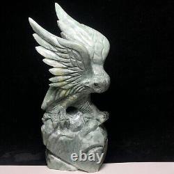 Natural quartz crystal cluster mineral specimen. Dushan Jade. Hand-carved eagle