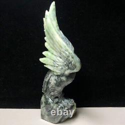 Natural quartz crystal cluster mineral specimen. Dushan Jade. Hand-carved eagle