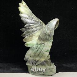 Natural quartz crystal cluster mineral specimen. Dushan Jade. Hand-carved eagle