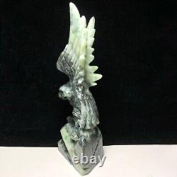 Natural quartz crystal cluster mineral specimen. Dushan Jade. Hand-carved eagle