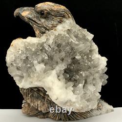 Natural quartz crystal cluster mineral specimen. Hand-carved. The eagle