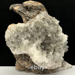 Natural quartz crystal cluster mineral specimen. Hand-carved. The eagle