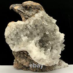 Natural quartz crystal cluster mineral specimen. Hand-carved. The eagle