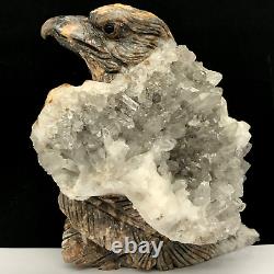 Natural quartz crystal cluster mineral specimen. Hand-carved. The eagle