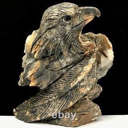 Natural quartz crystal cluster mineral specimen. Hand-carved. The eagle