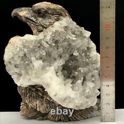 Natural quartz crystal cluster mineral specimen. Hand-carved. The eagle