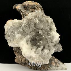 Natural quartz crystal cluster mineral specimen. Hand-carved. The eagle