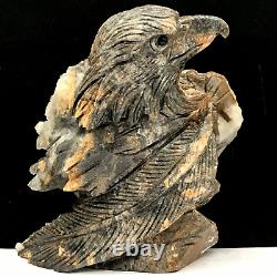 Natural quartz crystal cluster mineral specimen. Hand-carved. The eagle