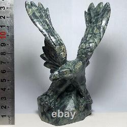 Natural quartz crystal cluster mineral specimen. Malachite. Hand-carved. Eagle