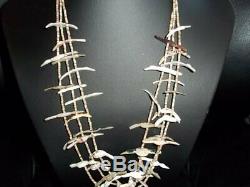 Old Man Leeyka Deyuse (D) hand carved three strand Eagle necklace. Verified